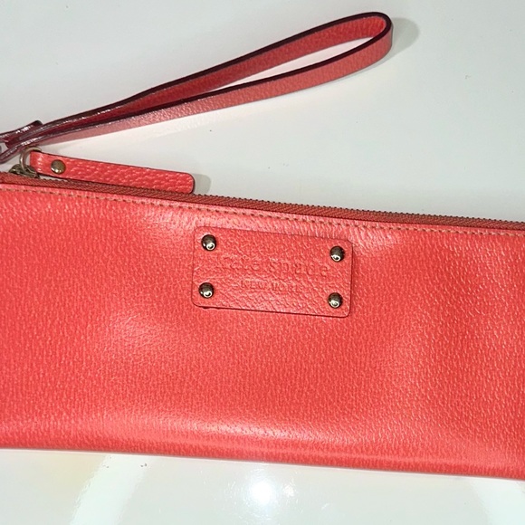 Kate Spade New York Coral Leather Mini
Wristlet Purse - Picture 1 of 4